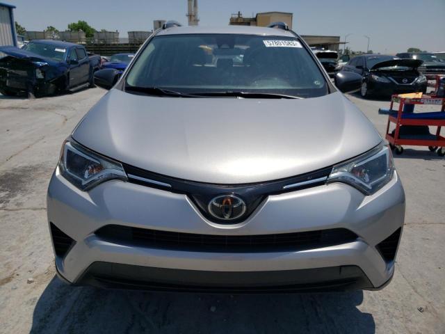 Photo 5 from auction – 2018 TOYOTA RAV4 LE with VIN JTMZFREV9JD116449