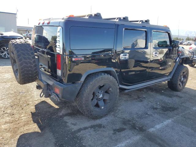 Photo 3 from auction – 2006 HUMMER H2 with VIN 5GRGN23U76H103404