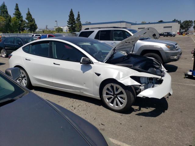 Photo 4 from auction – 2022 TESLA MODEL 3 with VIN 5YJ3E1EB1NF144437