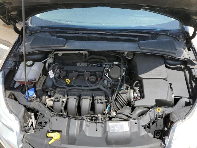 Photo 11 from auction – 2014 FORD FOCUS SE with VIN 1FADP3F20EL208804
