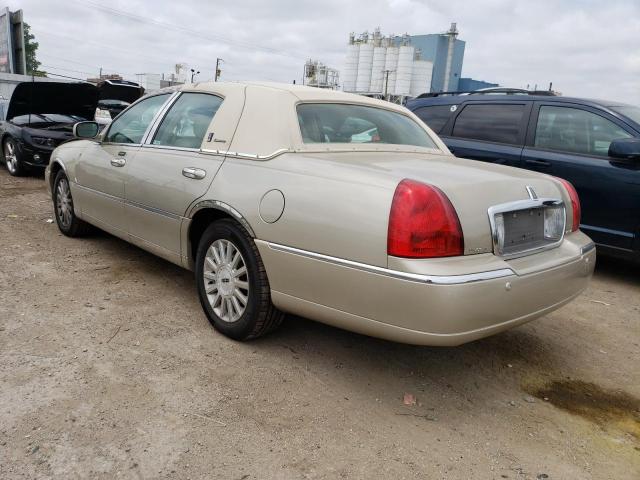 Photo 2 from auction – 2004 LINCOLN TOWN CAR E with VIN 1LNHM81W84Y664669