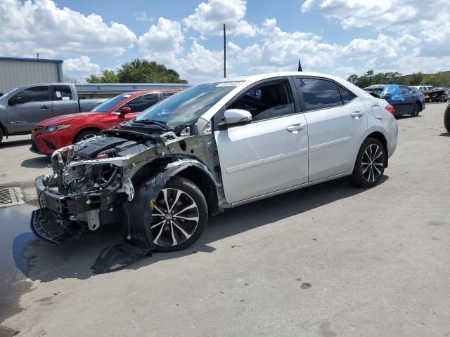 TOYOTA COROLLA L 2017 with VIN 2T1BURHE5HC832307 - Photo from auction