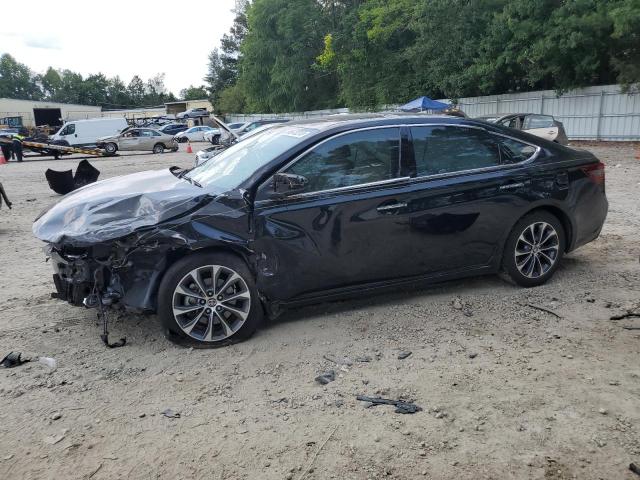 TOYOTA AVALON HYB 2016 with VIN 4T1BK1EB3GU208844 - Photo from auction