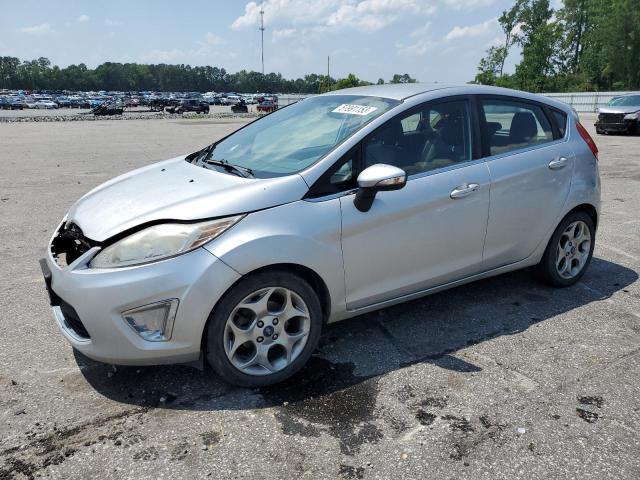 FORD FIESTA TIT 2013 with VIN 3FADP4FJ2DM110884 - Photo from auction