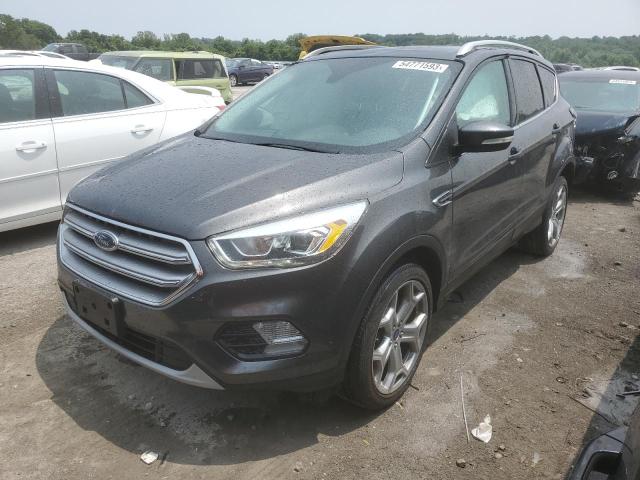 FORD ESCAPE TIT 2017 with VIN 1FMCU9J9XHUD31042 - Photo from auction