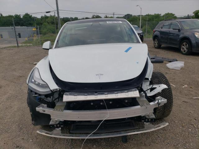 Photo 5 from auction – 2021 TESLA MODEL Y with VIN 5YJYGDEE6MF086173