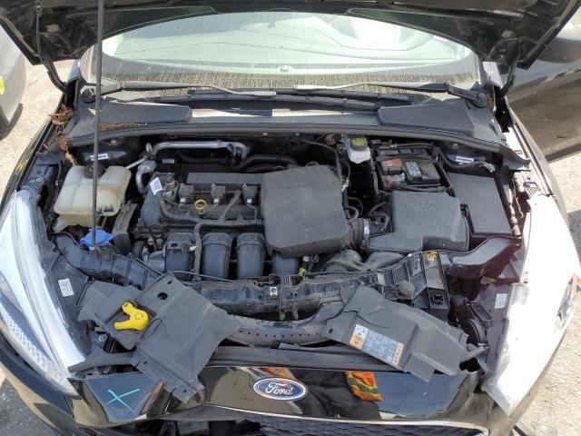 Photo 11 from auction – 2018 FORD FOCUS S with VIN 1FADP3E23JL244921