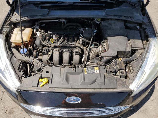 Photo 11 from auction – 2015 FORD FOCUS TITA with VIN 1FADP3J29FL200628