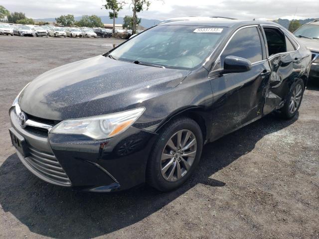 TOYOTA CAMRY LE 2016 with VIN 4T4BF1FK6GR548210 - Photo from auction