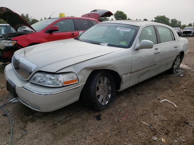 LINCOLN TOWN CAR U 2004 with VIN 1LNHM83W74Y601298 - Photo from auction