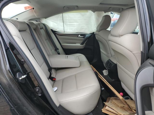 Photo 10 from auction – 2014 ACURA TL SE with VIN 19UUA8F39EA002542