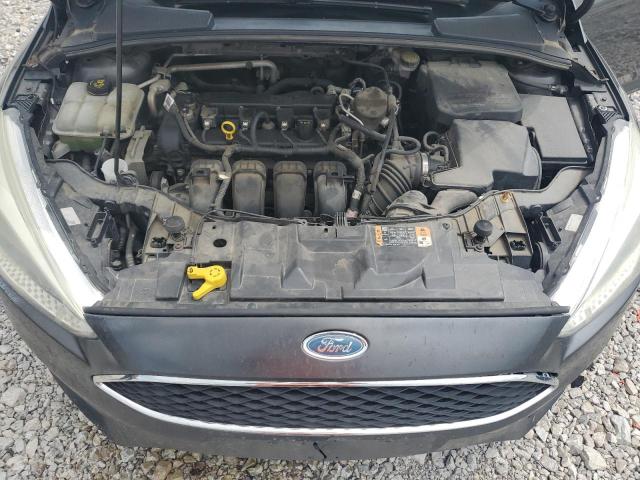 Photo 11 from auction – 2015 FORD FOCUS SE with VIN 1FADP3F27FL273604