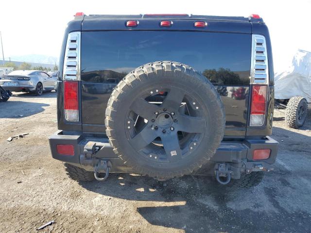 Photo 6 from auction – 2006 HUMMER H2 with VIN 5GRGN23U76H103404