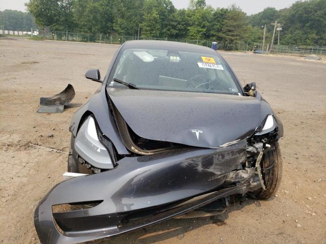 Photo 5 from auction – 2022 TESLA MODEL 3 with VIN 5YJ3E1EA5NF370648