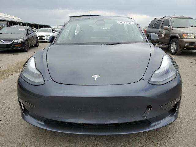 Photo 5 from auction – 2022 TESLA MODEL 3 with VIN 5YJ3E1EB9NF144640