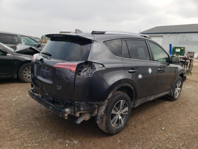Photo 3 from auction – 2017 TOYOTA RAV4 XLE with VIN JTMRFREV4HJ704111