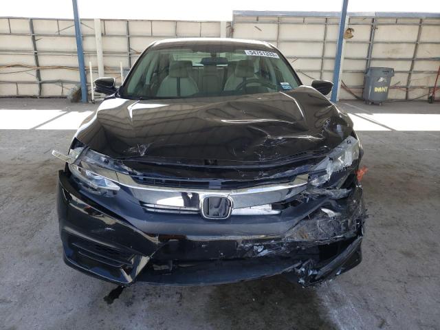 Photo 5 from auction – 2017 HONDA CIVIC EX with VIN 19XFC2F74HE057130