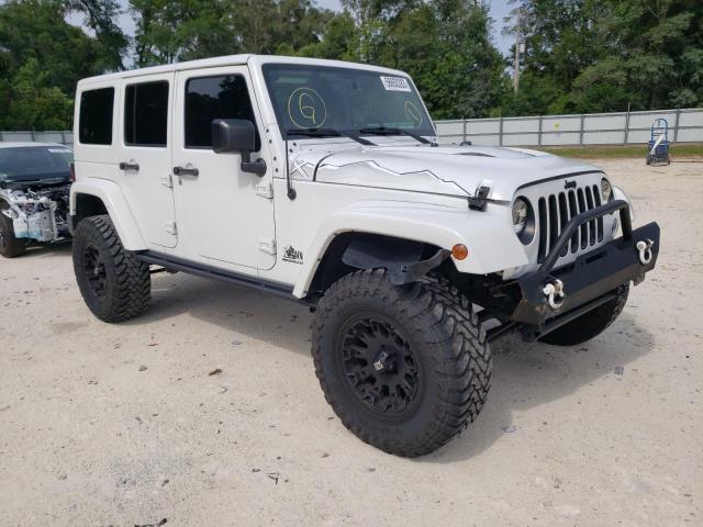 Photo 4 from auction – 2015 JEEP WRANGLER U with VIN 1C4BJWEG9FL623560