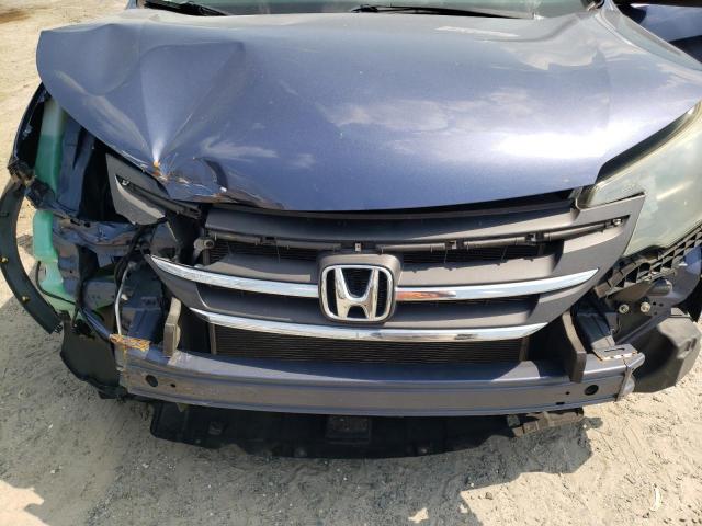 Photo 11 from auction – 2014 HONDA CR-V LX with VIN 2HKRM3H35EH556584