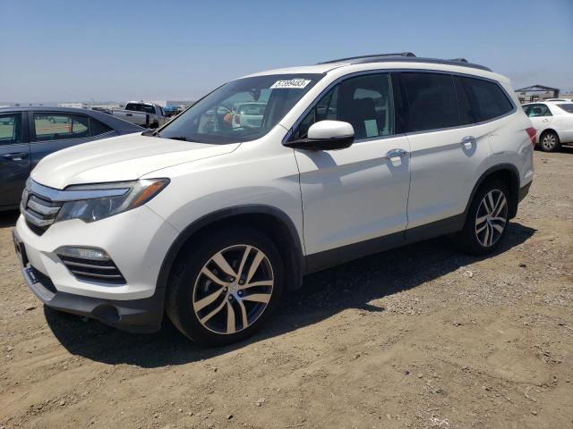HONDA PILOT TOUR 2018 with VIN 5FNYF6H93JB047534 - Photo from auction