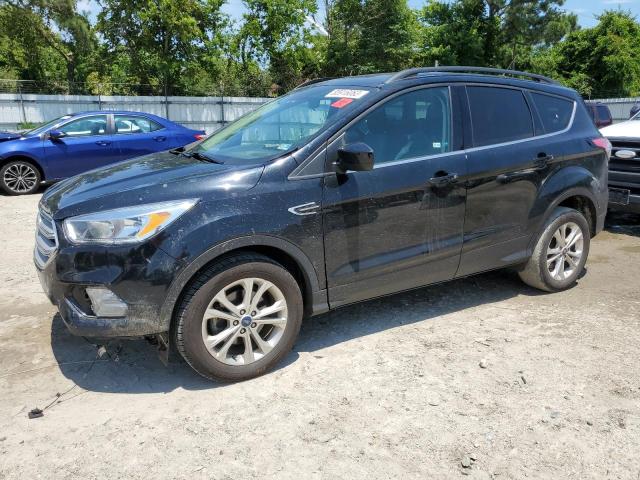 FORD ESCAPE SE 2018 with VIN 1FMCU0GD0JUA11841 - Photo from auction