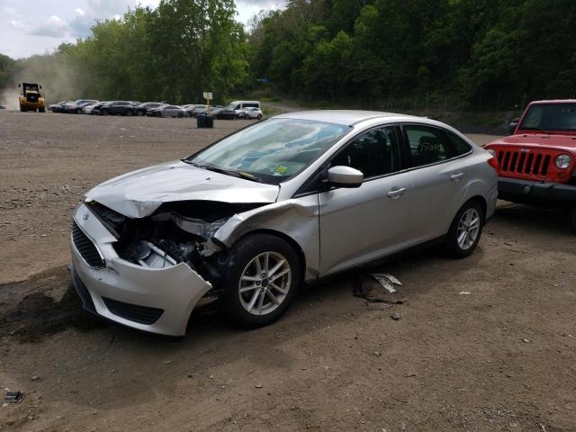 FORD FOCUS SE 2018 with VIN 1FADP3FEXJL242561 - Photo from auction