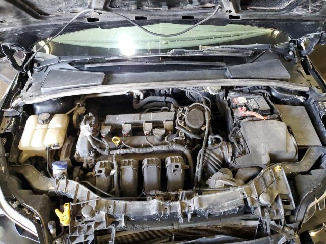 Photo 11 from auction – 2014 FORD FOCUS SE with VIN 1FADP3F21EL297668