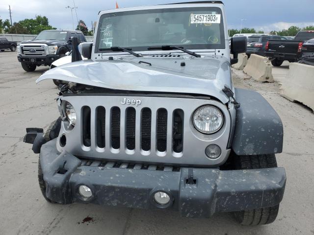 Photo 5 from auction – 2014 JEEP WRANGLER U with VIN 1C4BJWDG5EL319982