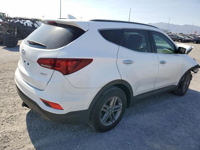 Photo 3 from auction – 2018 HYUNDAI SANTA FE S with VIN 5NMZU3LBXJH097512
