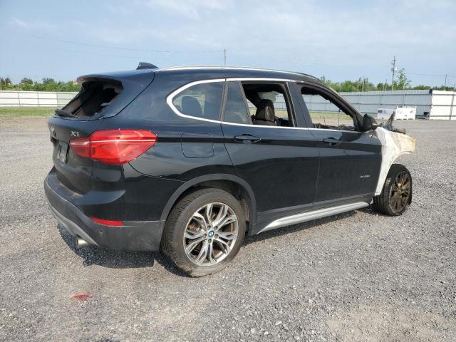 Photo 3 from auction – 2017 BMW X1 XDRIVE2 with VIN WBXHT3C30H5F85524