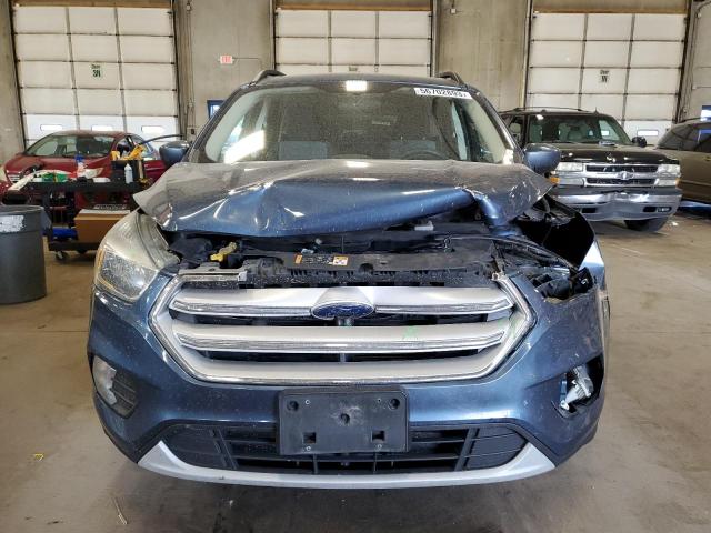 Photo 5 from auction – 2018 FORD ESCAPE SE with VIN 1FMCU9GD8JUB43749
