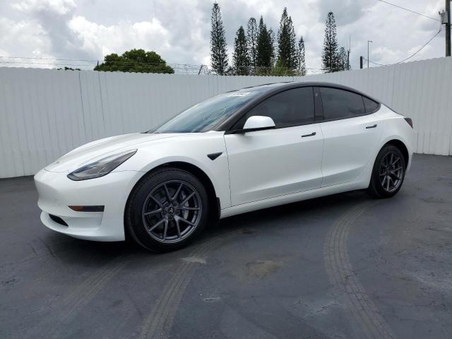 TESLA MODEL 3 2021 with VIN 5YJ3E1EA5MF058411 - Photo from auction