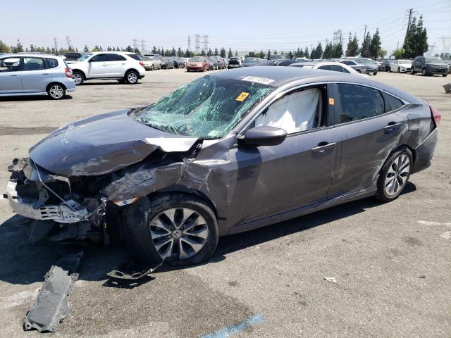 Photo 1 from auction – 2017 HONDA CIVIC LX with VIN 2HGFC2F50HH525875