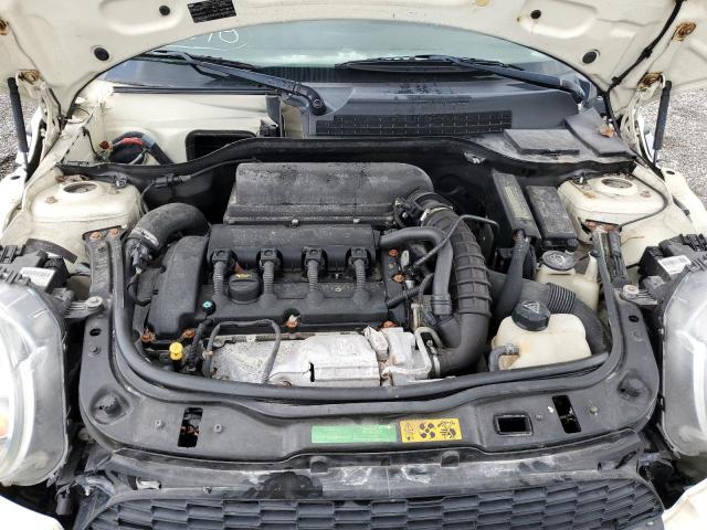 Photo 11 from auction – 2009 MINI COOPER S with VIN WMWMS33589TG89057