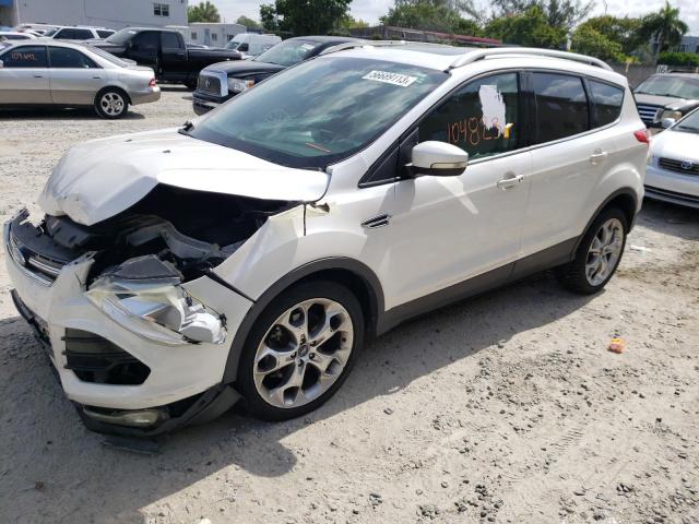 FORD ESCAPE TIT 2014 with VIN 1FMCU0J93EUA50451 - Photo from auction