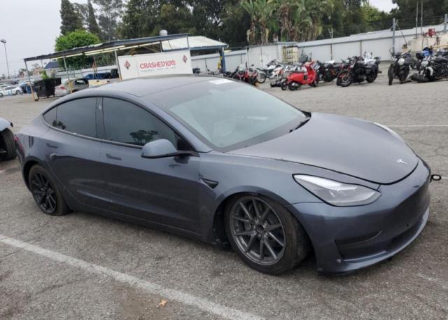 Photo 4 from auction – 2022 TESLA MODEL 3 with VIN 5YJ3E1EA8NF147634