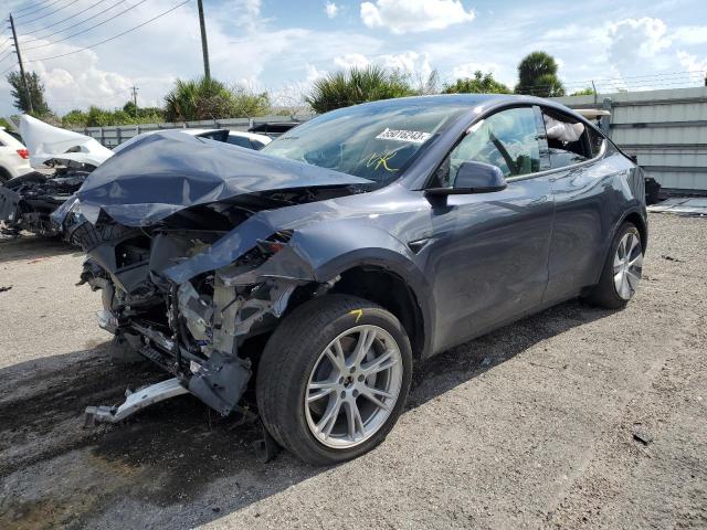 TESLA MODEL Y 2022 with VIN 7SAYGDEE1NF399779 - Photo from auction