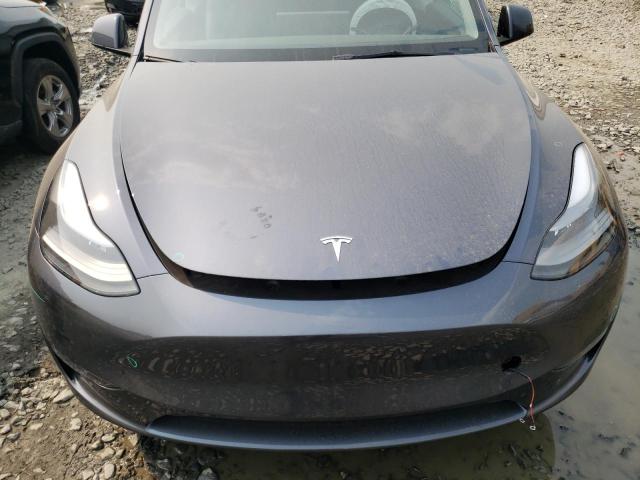 Photo 5 from auction – 2023 TESLA MODEL Y with VIN 7SAYGDEE0PF689336