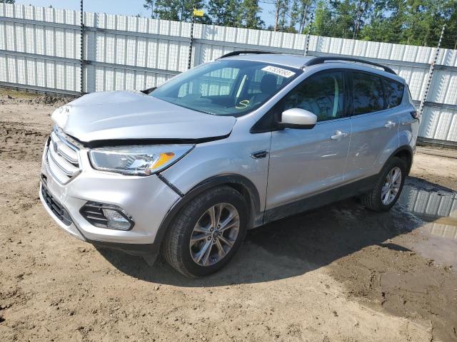 FORD ESCAPE SE 2018 with VIN 1FMCU0GD4JUA89099 - Photo from auction