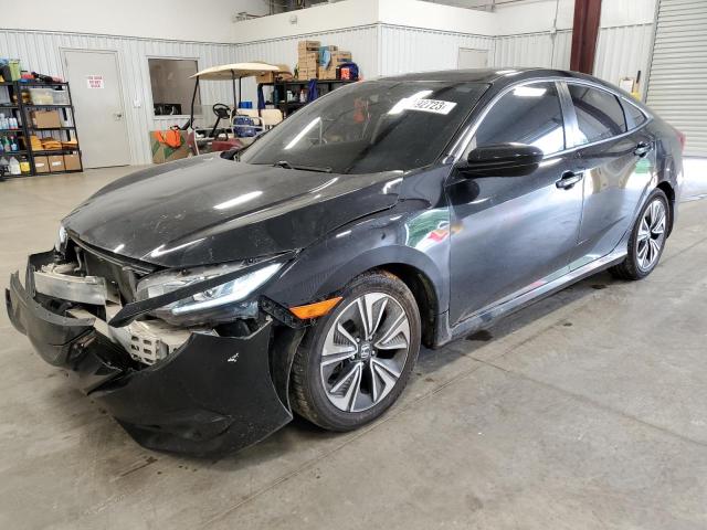 HONDA CIVIC EX 2017 with VIN 2HGFC1F34HH635630 - Photo from auction
