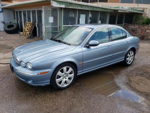 JAGUAR X-TYPE 3.0 2004 with VIN SAJEA51CX4WD89584 - Photo from auction