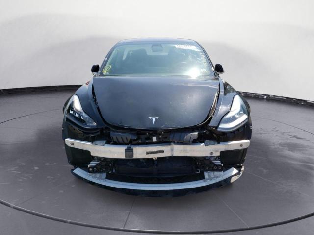 Photo 5 from auction – 2018 TESLA MODEL 3 with VIN 5YJ3E1EB3JF145230