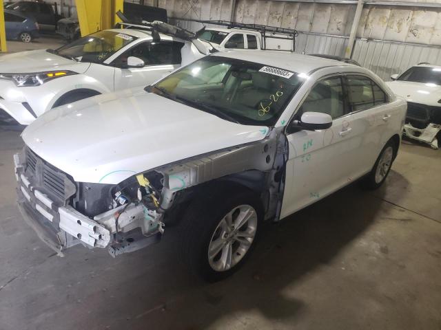 FORD TAURUS SEL 2014 with VIN 1FAHP2E84EG175736 - Photo from auction