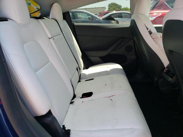 Photo 10 from auction – 2023 TESLA MODEL Y with VIN 7SAYGAEE0PF765779