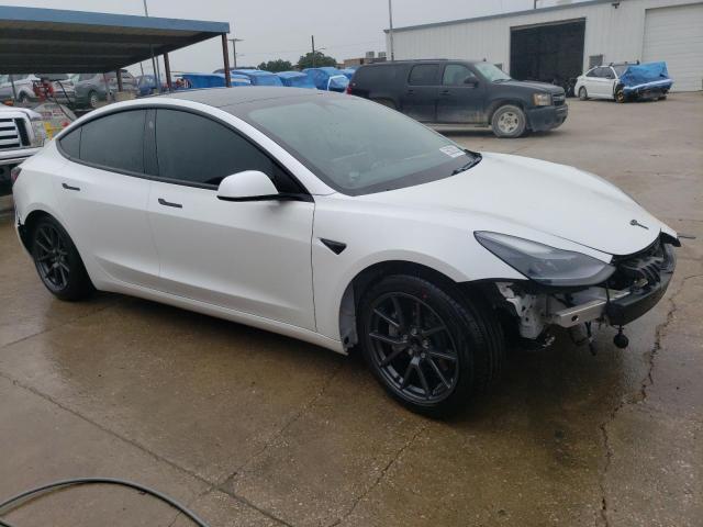 Photo 4 from auction – 2021 TESLA MODEL 3 with VIN 5YJ3E1EA9MF988974