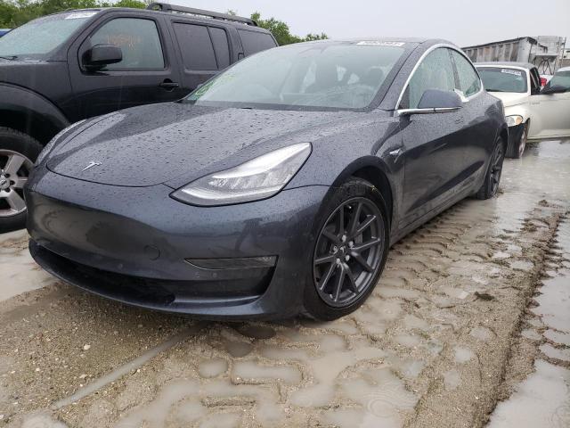 TESLA MODEL 3 2018 with VIN 5YJ3E1EB1JF069877 - Photo from auction