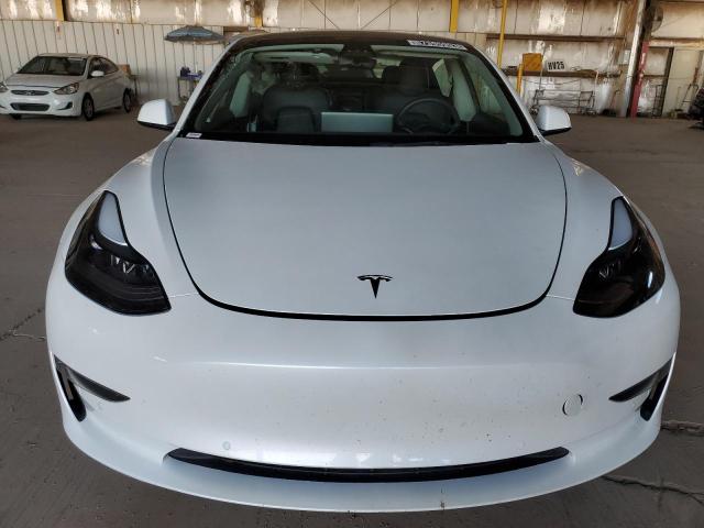Photo 5 from auction – 2021 TESLA MODEL 3 with VIN 5YJ3E1EA0MF094040