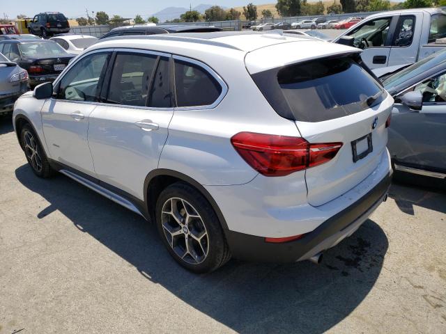 Photo 2 from auction – 2017 BMW X1 XDRIVE2 with VIN WBXHT3C37H5F68431