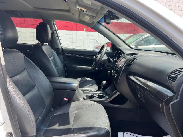 Photo 5 from auction – 2013 KIA SORENTO LX with VIN 5XYKT4A69DG356201
