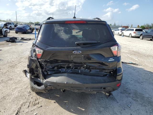 Photo 6 from auction – 2018 FORD ESCAPE SE with VIN 1FMCU0GD9JUB74939